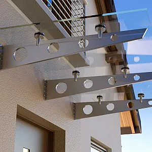 Glasvordach, Haustürvordach mit verspielten Stahlträgern und Muster